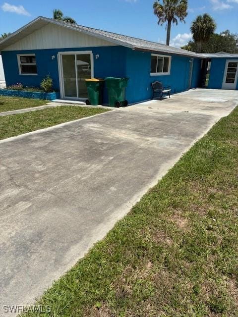 1610 Woodlawn Ave, Punta Gorda, FL 33950 - single story home with a front yard
