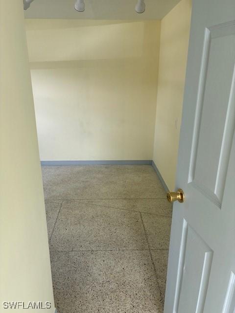 1610 Woodlawn Ave, Punta Gorda, FL 33950 - unfurnished room with speckle patterned floor and baseboards