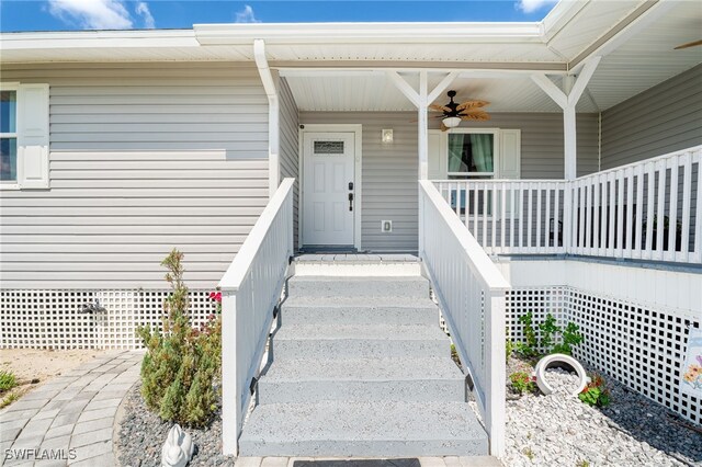 2313 Hines Ave, Alva, FL 33920 - view of exterior entry with a ceiling fan and covered porch