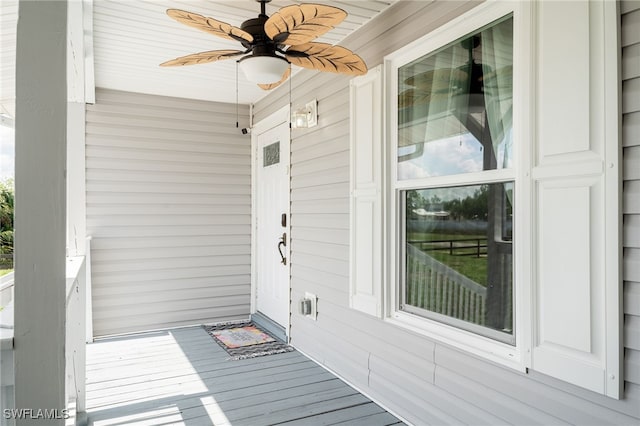 2313 Hines Ave, Alva, FL 33920 - doorway to property featuring ceiling fan and covered porch