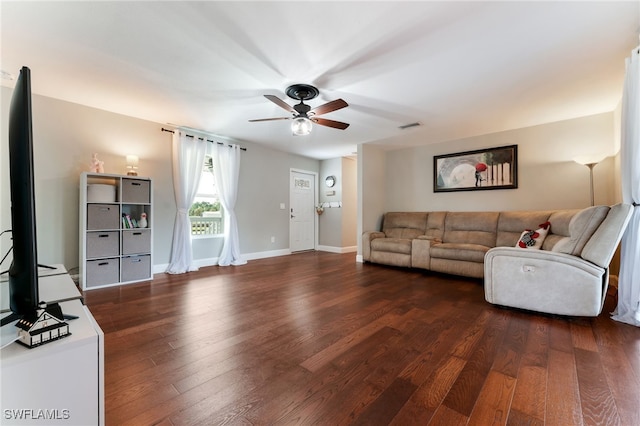 2313 Hines Ave, Alva, FL 33920 - living area featuring a ceiling fan, dark wood-style flooring, and baseboards