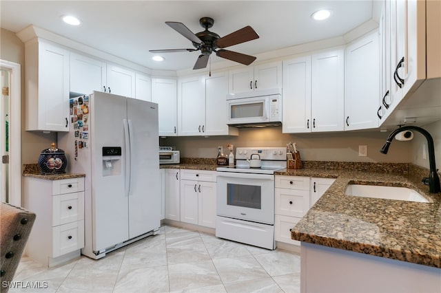 2313 Hines Ave, Alva, FL 33920 - kitchen with white appliances, a sink, a ceiling fan, white cabinets, and recessed lighting