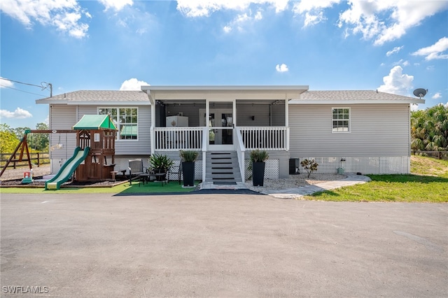 2313 Hines Ave, Alva, FL 33920 - view of front of property with a sunroom
