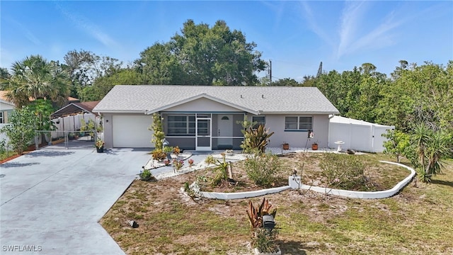 426 Chestnut Ave NW, Port Charlotte, FL 33952 - single story home featuring a garage, concrete driveway, a gate, and stucco siding