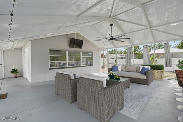 426 Chestnut Ave NW, Port Charlotte, FL 33952 - view of patio with a ceiling fan and an outdoor living space