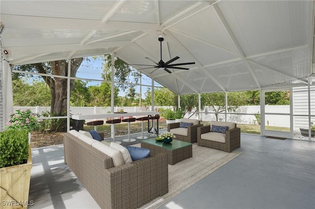 426 Chestnut Ave NW, Port Charlotte, FL 33952 - fenced backyard with an outdoor hangout area and a patio