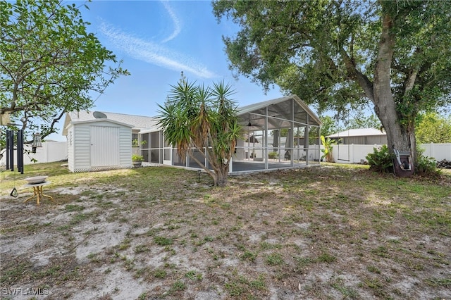 426 Chestnut Ave NW, Port Charlotte, FL 33952 - view of yard featuring a sunroom