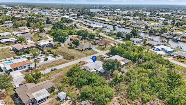 426 Chestnut Ave NW, Port Charlotte, FL 33952 - aerial view of residential area with a nearby body of water