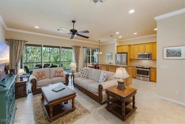 21726 Baccarat Ln Unit 201, Estero, FL 33928 - living room with ceiling fan, light tile patterned flooring, recessed lighting, crown molding, and baseboards