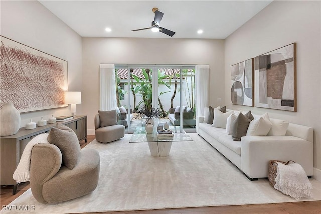 917 Tierra Lago Way, Naples, FL 34119 - living room with a ceiling fan, wood finished floors, baseboards, and recessed lighting