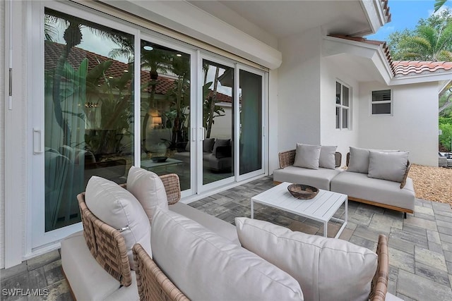 917 Tierra Lago Way, Naples, FL 34119 - view of patio with an outdoor living space