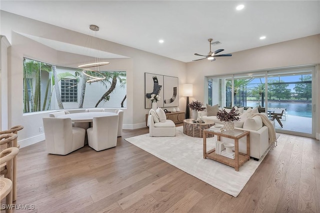 917 Tierra Lago Way, Naples, FL 34119 - living room with light wood-style floors, baseboards, recessed lighting, and ceiling fan