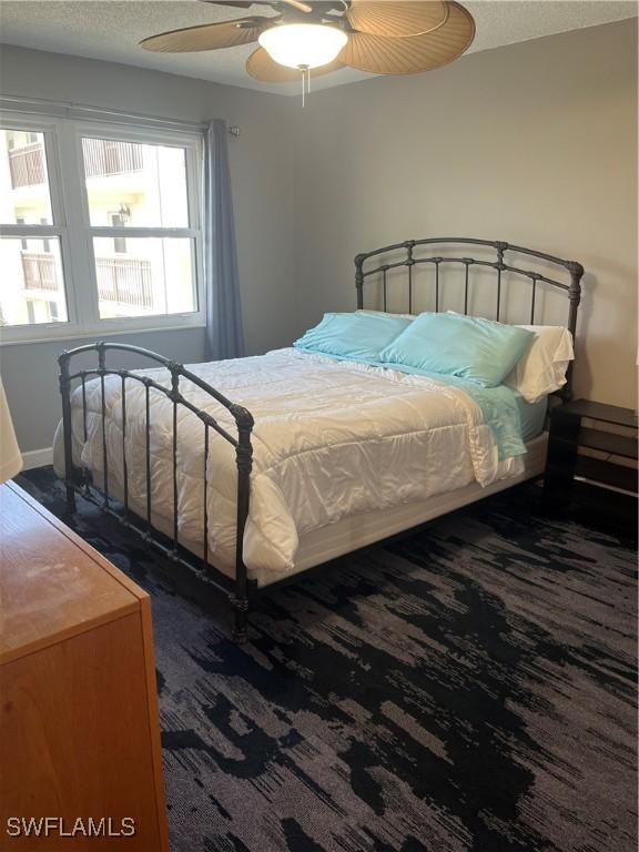 1740 Pine Valley Dr Unit 205, Fort Myers, FL 33907 - bedroom featuring carpet, a ceiling fan, and baseboards