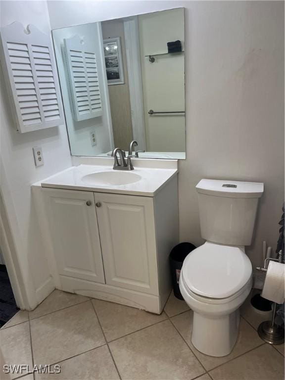 1740 Pine Valley Dr Unit 205, Fort Myers, FL 33907 - bathroom with vanity, toilet, and tile patterned flooring