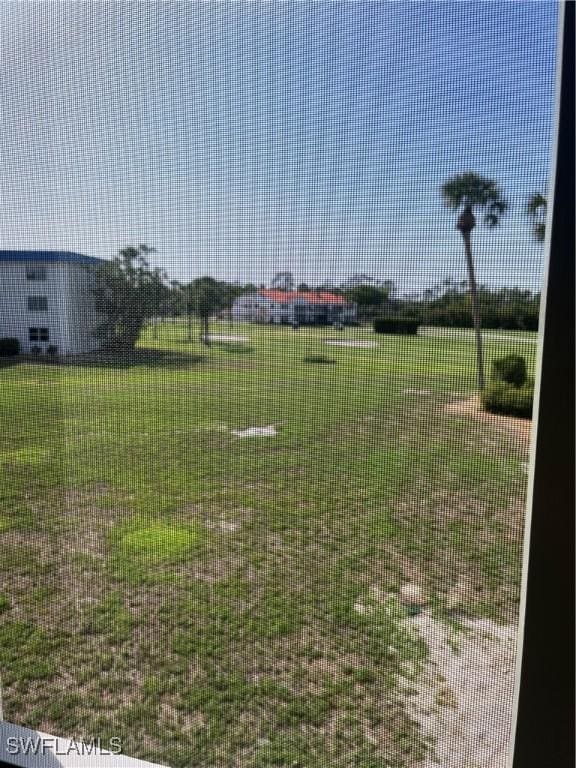 1740 Pine Valley Dr Unit 205, Fort Myers, FL 33907 - view of green lawn
