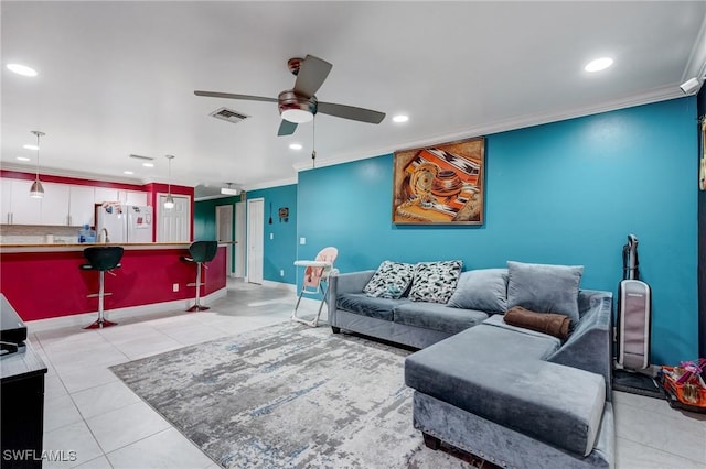4520 Douglas Ln, Lehigh Acres, FL 33973 - living area with crown molding, light tile patterned floors, recessed lighting, ceiling fan, and baseboards