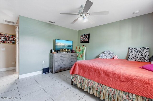4520 Douglas Ln, Lehigh Acres, FL 33973 - bedroom featuring light tile patterned flooring, a ceiling fan, and baseboards
