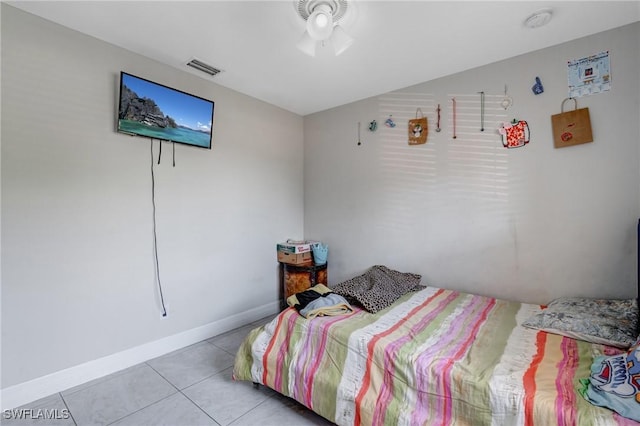 4520 Douglas Ln, Lehigh Acres, FL 33973 - tiled bedroom with baseboards