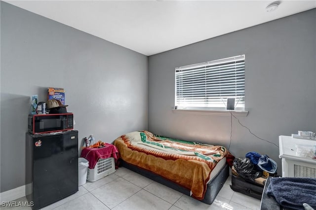 4520 Douglas Ln, Lehigh Acres, FL 33973 - bedroom featuring light tile patterned floors