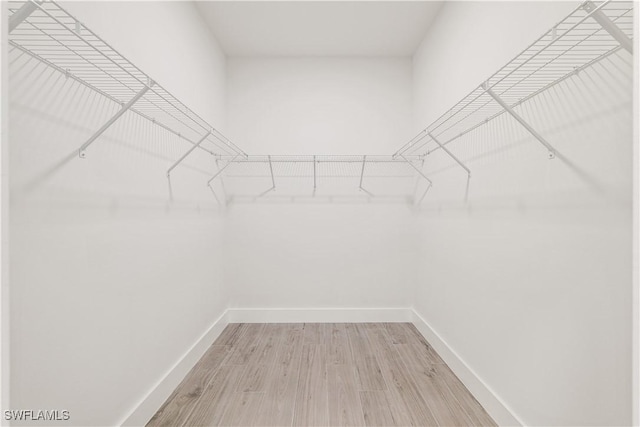 3203 18th St W, Lehigh Acres, FL 33971 - walk in closet featuring light wood-style floors