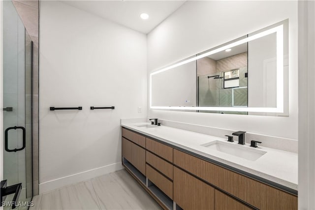 3203 18th St W, Lehigh Acres, FL 33971 - bathroom featuring double vanity, a stall shower, baseboards, marble finish floors, and recessed lighting