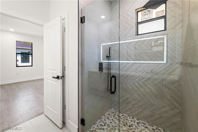 3203 18th St W, Lehigh Acres, FL 33971 - bathroom with a shower stall and baseboards