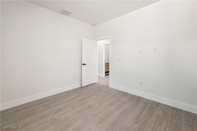 3203 18th St W, Lehigh Acres, FL 33971 - unfurnished room featuring light wood-style flooring and baseboards