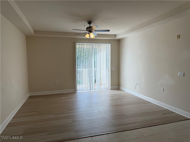 3947 Del Sol Ln Unit 203, Cape Coral, FL 33909 - unfurnished room featuring ceiling fan, light wood-type flooring, and baseboards