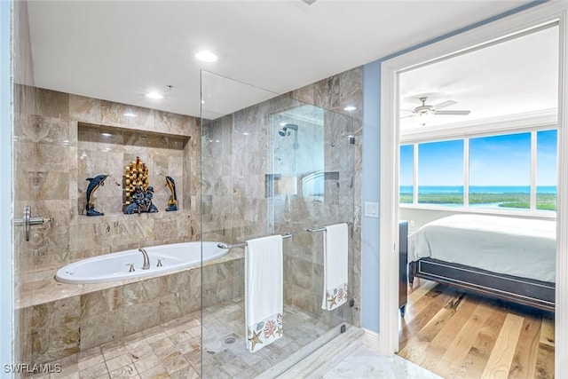 275 Indies Way Unit 1603, Naples, FL 34110 - ensuite bathroom with a garden tub, a walk in shower, ceiling fan, and a water view