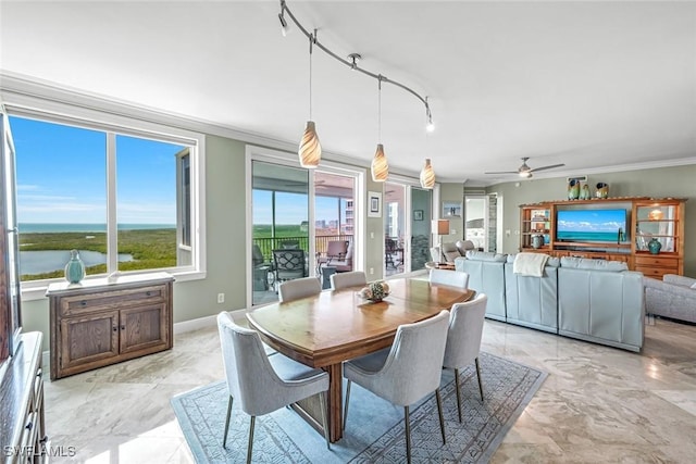 275 Indies Way Unit 1603, Naples, FL 34110 - dining room with crown molding, ceiling fan, and baseboards
