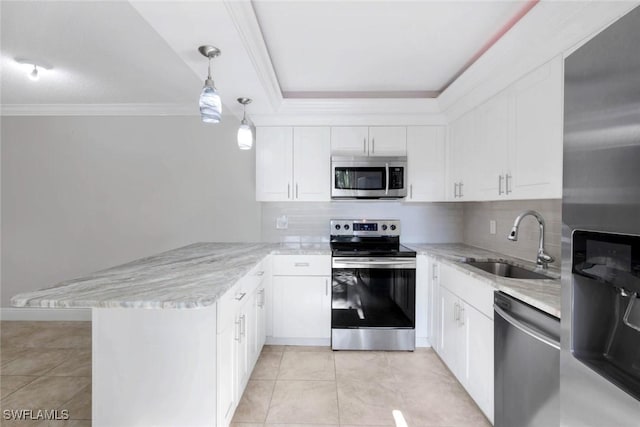 1501 Park Meadows Dr Unit 3, Fort Myers, FL 33907 - kitchen with appliances with stainless steel finishes, a sink, a peninsula, tasteful backsplash, and light stone countertops
