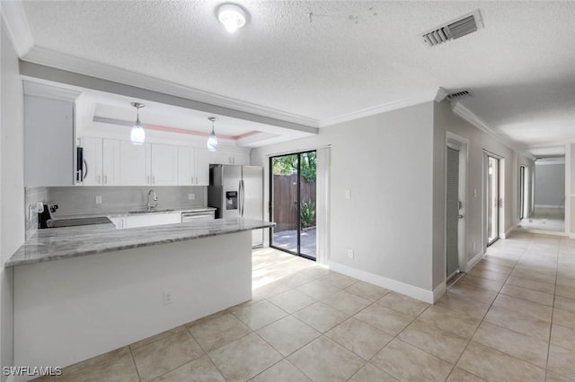 1501 Park Meadows Dr Unit 3, Fort Myers, FL 33907 - kitchen featuring appliances with stainless steel finishes, a peninsula, white cabinetry, light tile patterned floors, and light stone counters