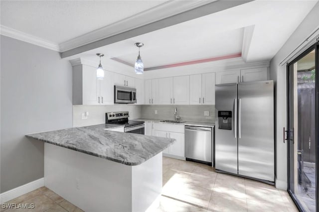 1501 Park Meadows Dr Unit 3, Fort Myers, FL 33907 - kitchen with appliances with stainless steel finishes, a sink, light stone countertops, a peninsula, and white cabinetry