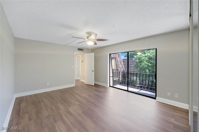 1501 Park Meadows Dr Unit 3, Fort Myers, FL 33907 - unfurnished room with a textured ceiling, a ceiling fan, wood finished floors, and baseboards