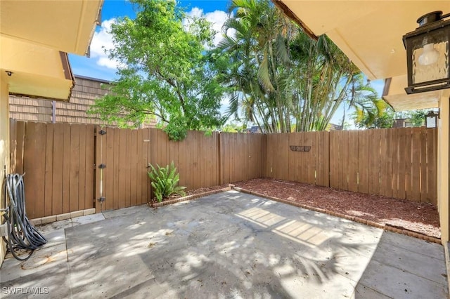 1501 Park Meadows Dr Unit 3, Fort Myers, FL 33907 - fenced backyard featuring a patio and a gate