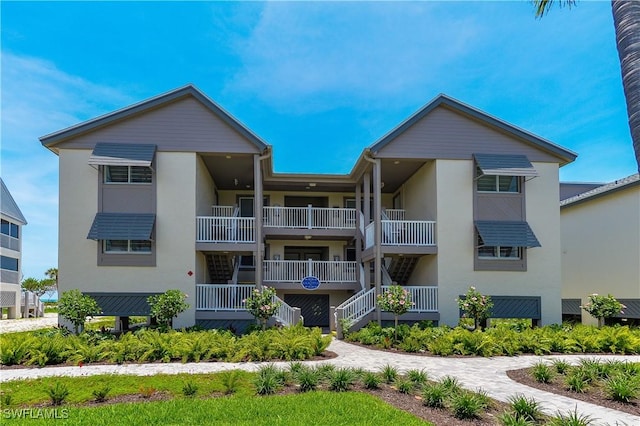 2255 W Gulf Dr Unit 140, Sanibel, FL 33957 - view of property featuring stairs