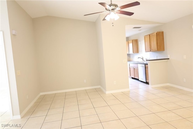 4526/4524 28th St SW, Lehigh Acres, FL 33973 - spare room with lofted ceiling, ceiling fan, a sink, light tile patterned flooring, and baseboards