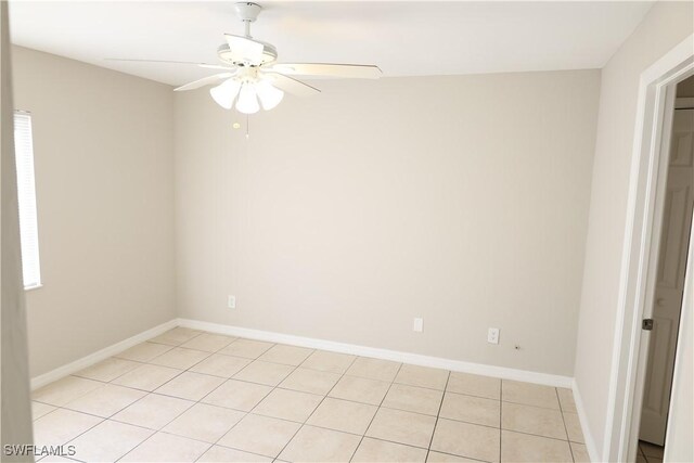 4526/4524 28th St SW, Lehigh Acres, FL 33973 - spare room featuring ceiling fan, baseboards, and light tile patterned flooring