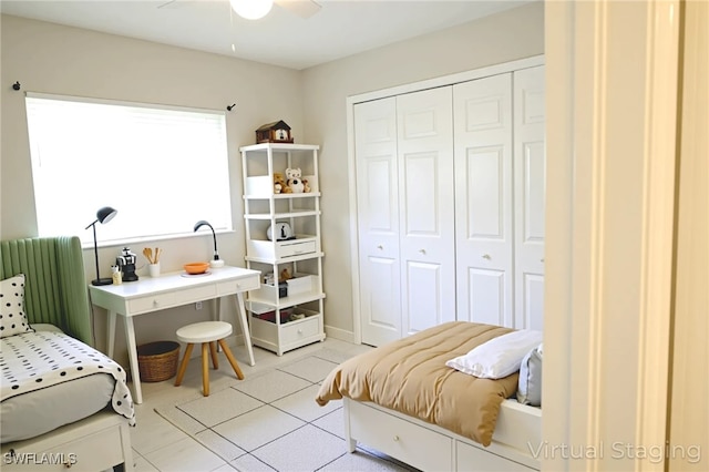 4526/4524 28th St SW, Lehigh Acres, FL 33973 - bedroom with light tile patterned floors, a closet, and ceiling fan