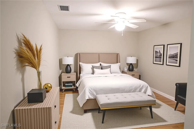4526/4524 28th St SW, Lehigh Acres, FL 33973 - bedroom featuring wood finished floors, baseboards, and a ceiling fan