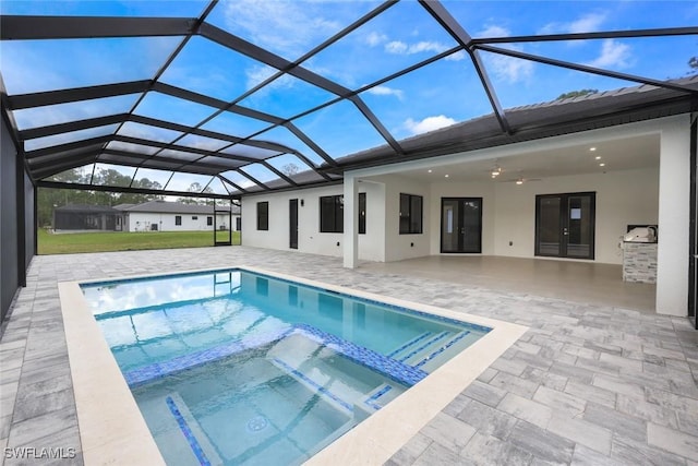 2806-2840 Golden Gate Blvd W, Naples, FL 34117 - view of pool featuring a patio area, a pool with connected hot tub, and glass enclosure