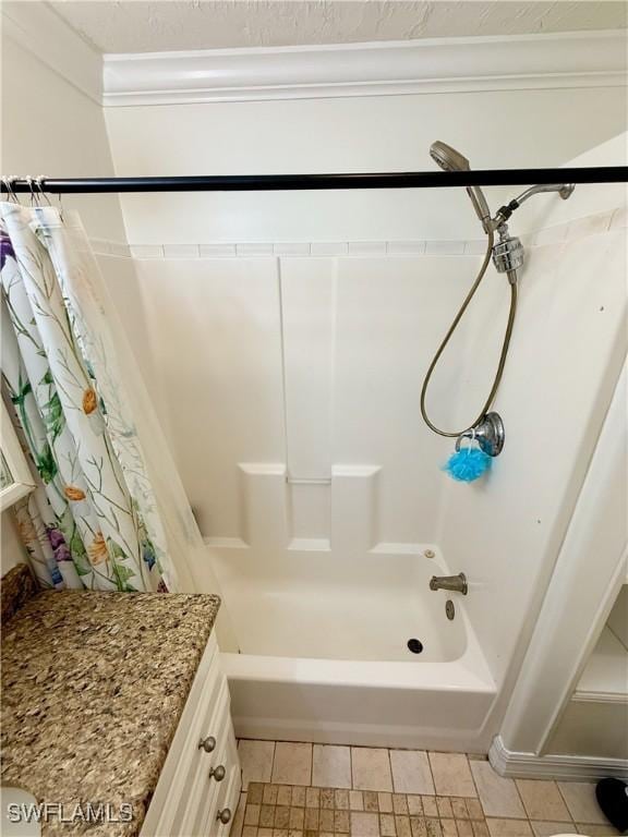 3700 26th St SW, Lehigh Acres, FL 33976 - full bathroom featuring shower / tub combo with curtain, vanity, and crown molding