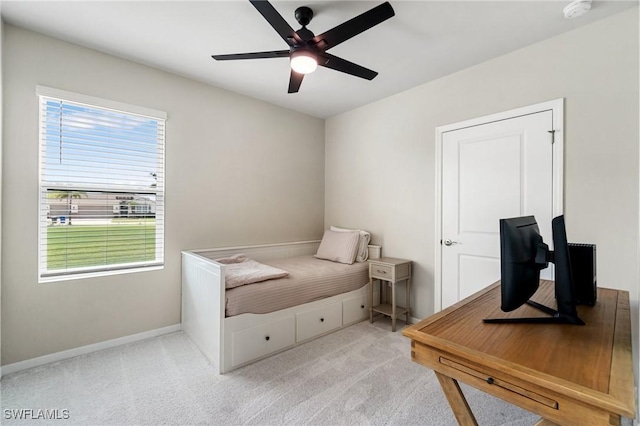 8833 Swell Brooks Ct, North Fort Myers, FL 33917 - bedroom featuring light colored carpet, baseboards, and a ceiling fan