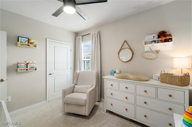 8833 Swell Brooks Ct, North Fort Myers, FL 33917 - sitting room with ceiling fan, light carpet, and baseboards