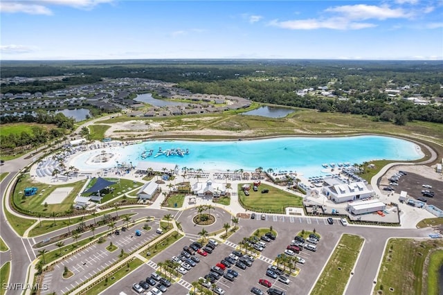 8833 Swell Brooks Ct, North Fort Myers, FL 33917 - drone / aerial view of a nearby body of water and a pool