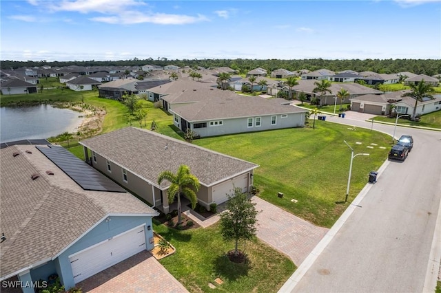 8833 Swell Brooks Ct, North Fort Myers, FL 33917 - aerial perspective of suburban area featuring a large body of water