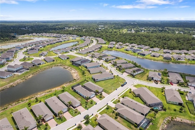 8833 Swell Brooks Ct, North Fort Myers, FL 33917 - aerial view of property's location with nearby suburban area and a nearby body of water
