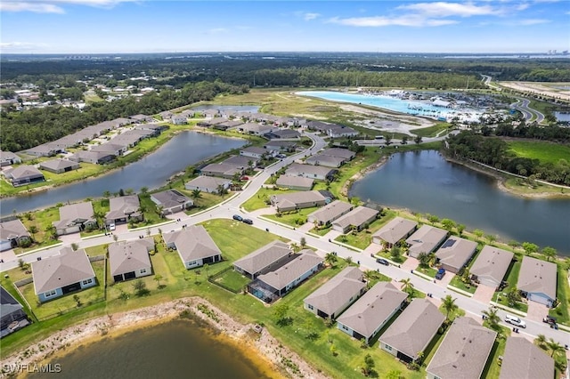8833 Swell Brooks Ct, North Fort Myers, FL 33917 - aerial overview of property's location featuring nearby suburban area and a large body of water