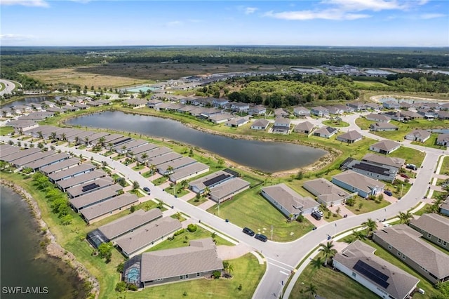 8833 Swell Brooks Ct, North Fort Myers, FL 33917 - aerial view of property and surrounding area featuring nearby suburban area and a nearby body of water