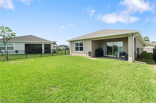 8833 Swell Brooks Ct, North Fort Myers, FL 33917 - rear view of property featuring stucco siding